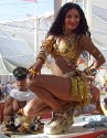Anat in Gold Outfit with Gold Tassels at Center Camp Cafe