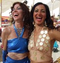Robbie in Blue Outfit and Anat in Gold Coin Outfit at Center Camp Cafe. Love Those Smiles!
